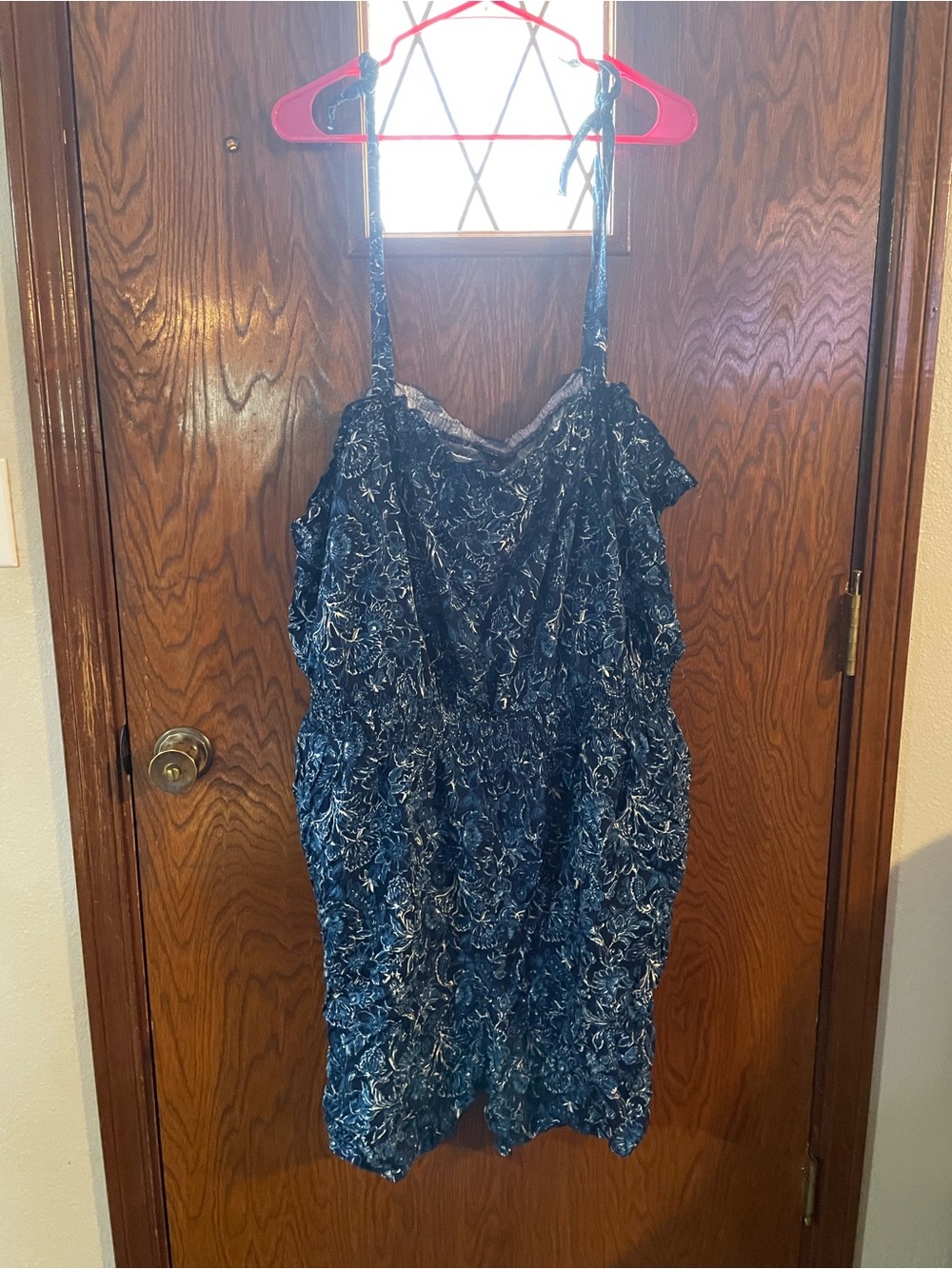 Blue Floral Print Sleeveless Women’s romper with pockets
